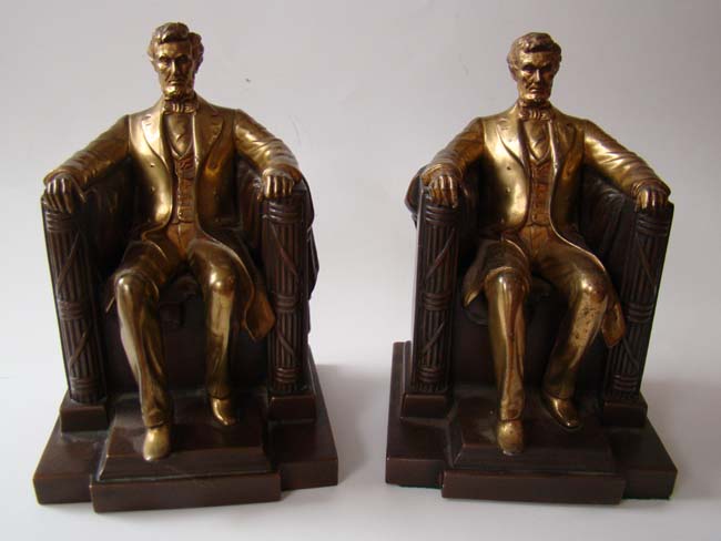 A fine pair "Lincoln in the chair" bookends by Jennings Brothers circa 1935